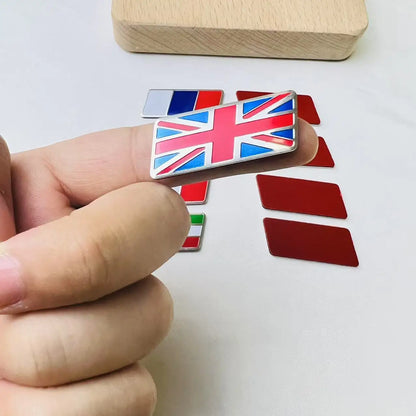 Alloy Flag Emblem Sticker for BMW Audi Toyota MG – Pro Decor – Car Accessories | MotorWorld Marketplace