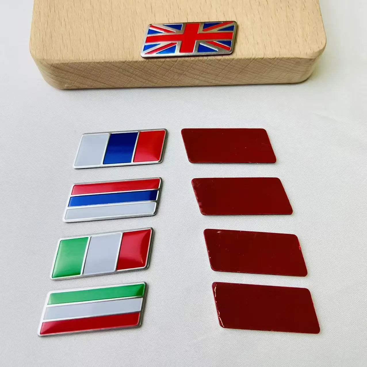 Alloy Flag Emblem Sticker for BMW Audi Toyota MG – Pro Decor – Car Accessories | MotorWorld Marketplace