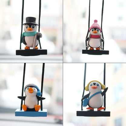 Décoration suspendue de voiture en forme de pingouin en traîneau pivotant