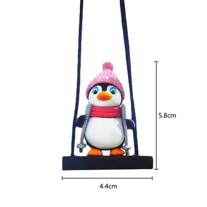 Décoration suspendue de voiture en forme de pingouin en traîneau pivotant